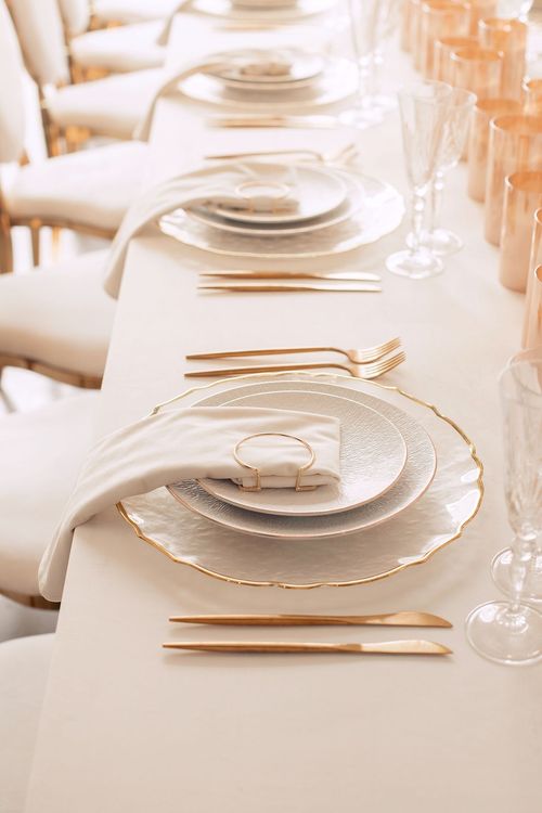 Ivory table service at long rectangular table