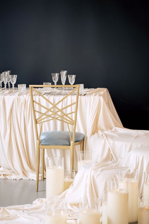 Ivory table setting at rectangular table