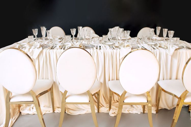 Ivory table setting at rectangular table