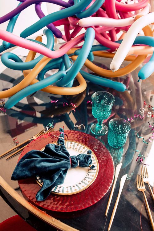 Kids blue-red table setting at round table