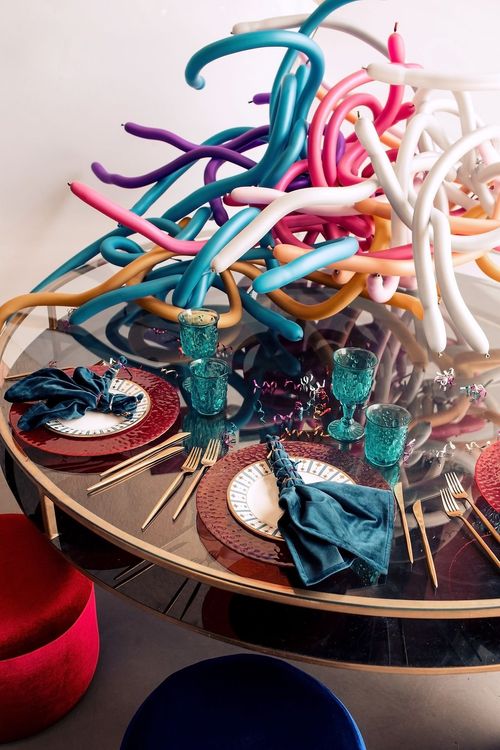 Kids blue-red table setting at round table