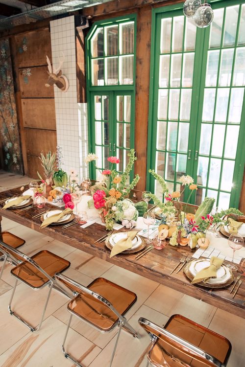 Modern Rectangular Table — Clear Chairs, Floral + Fruit