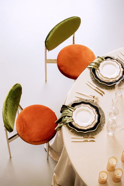 Modern Round Dining with Pumpkin Accents