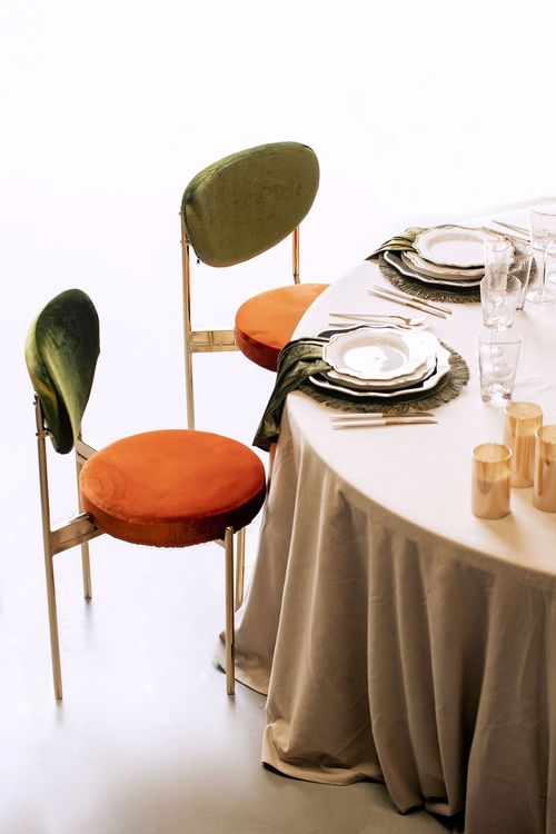 Modern Round Dining with Pumpkin Accents