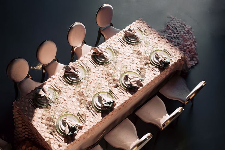 Nude table setting at rectangular table