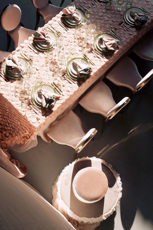 Nude table setting at rectangular table