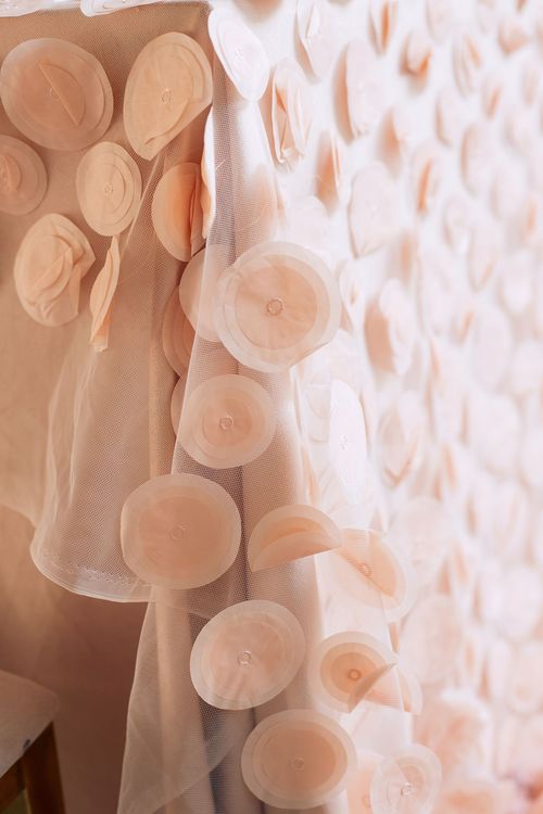 Nude table setting at rectangular table