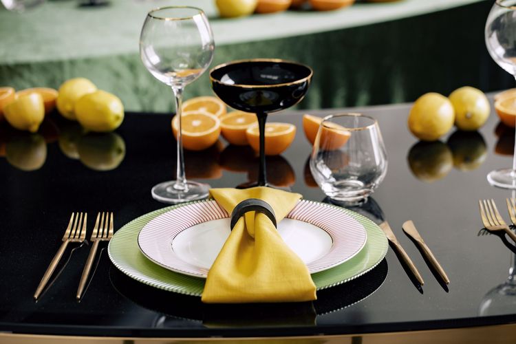 Orange green serpentine table set with poufs
