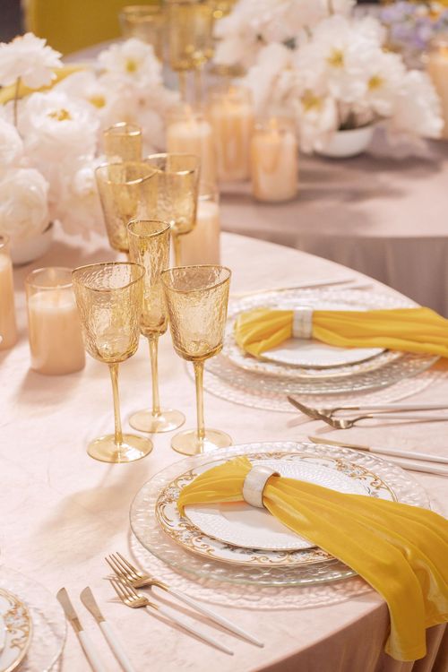 Peach-lavender table setting at caterpillar table