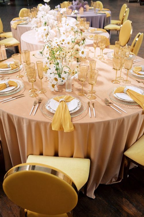 Peach-lavender table setting at caterpillar table