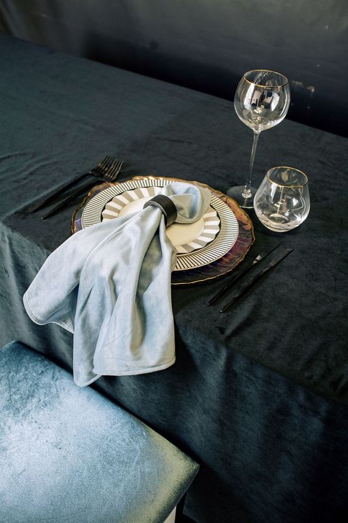 Pearl-blue table setting at rectangular table