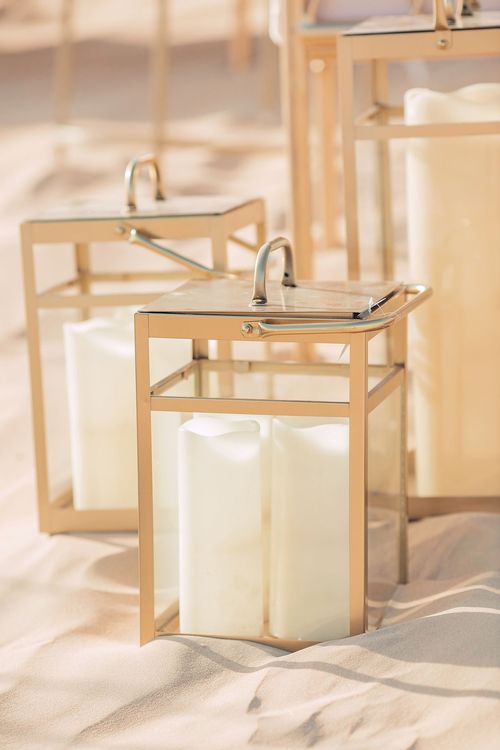 Pink desert lounge setup with ottomans