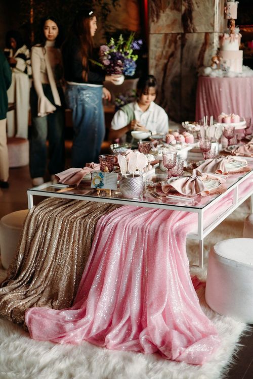 Pink kids party with velvet poufs