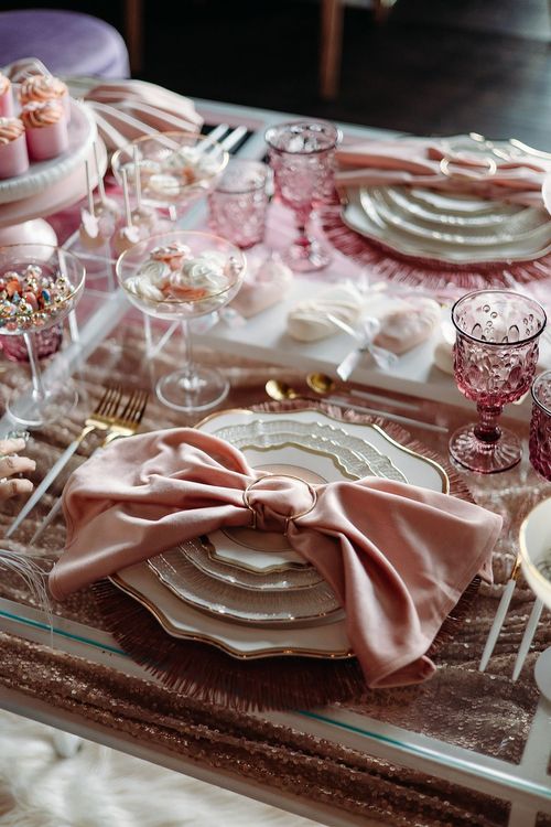 Pink kids party with velvet poufs