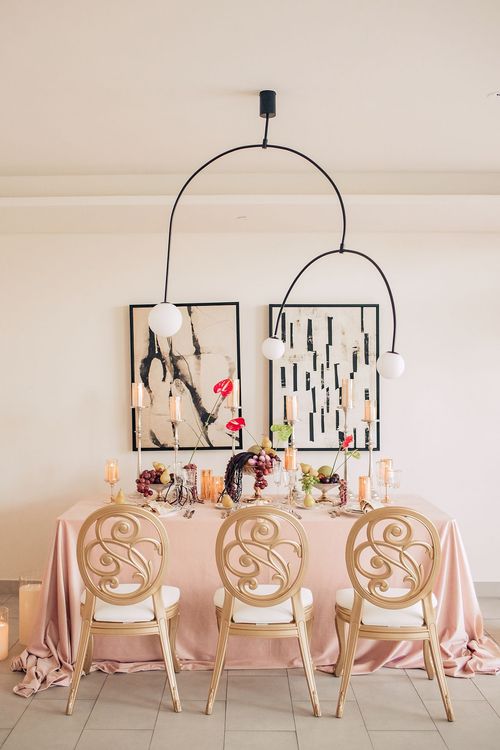 Rectangular table with carved velvet chairs