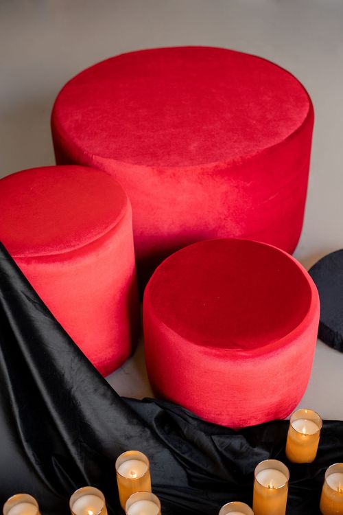 Red-black table setting at rectangular table