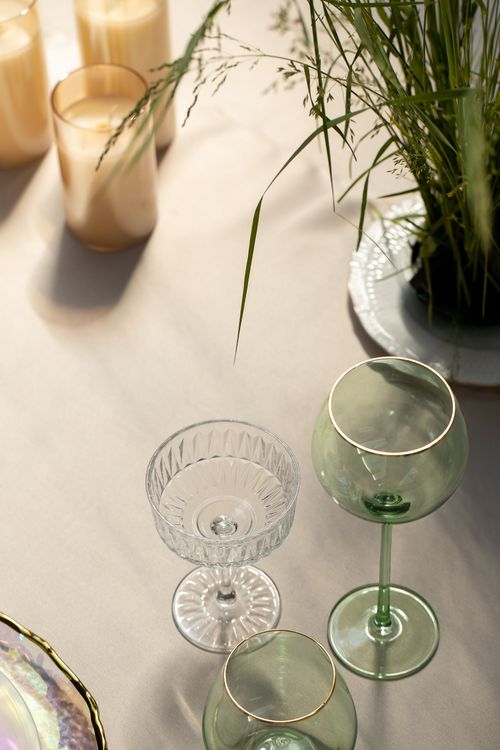 Round Dinner — Pearlescent Plate, Pistachio Glasses & Fern Velvet Chairs