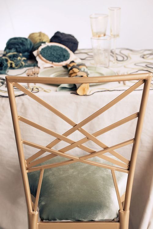 Soft green table setting with embroidery hoops