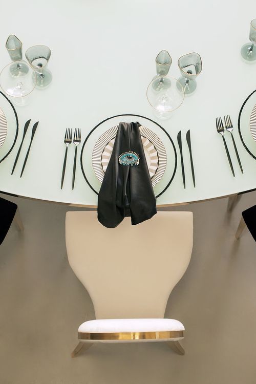 Eye-shaped table and black-and-white set