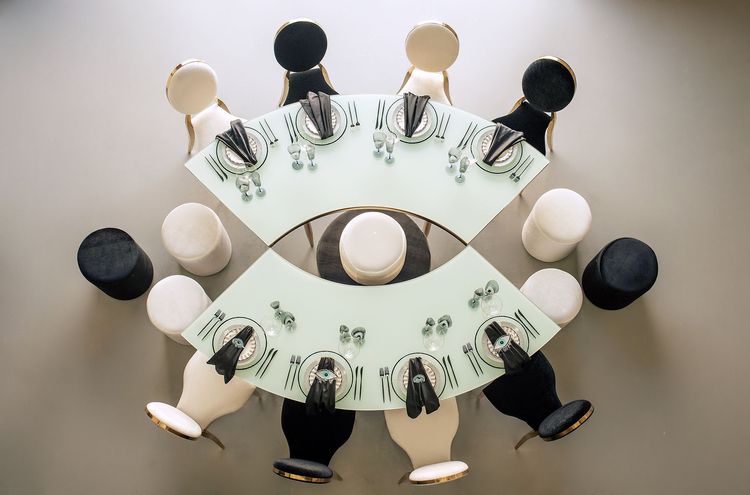 Eye-shaped table and black-and-white set