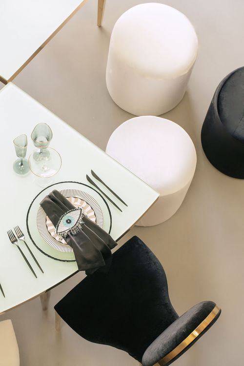 Eye-shaped table and black-and-white set