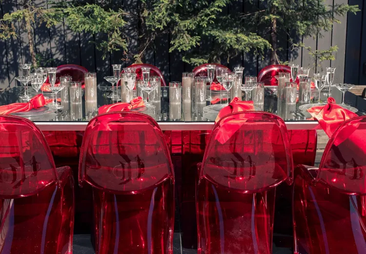 Translucent set with red accents on a white rectangular table