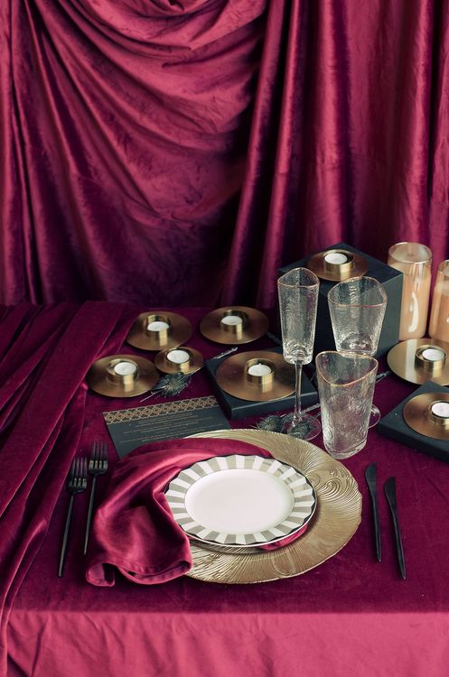 Velvet-Draped Dining — Gold Candles, Burgundy Noir