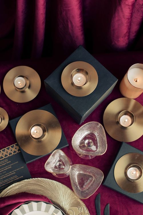 Velvet-Draped Dining — Gold Candles, Burgundy Noir