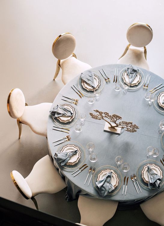 White-blue table setting at round table
