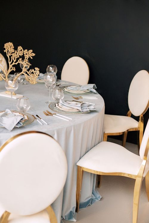 White-blue table setting at round table