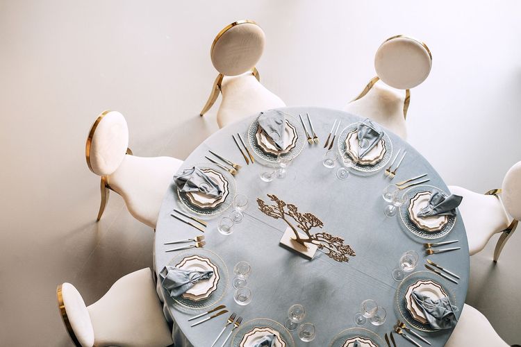 White-blue table setting at round table