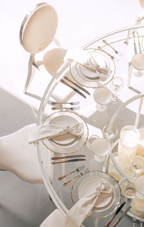 White glass round table modern setup