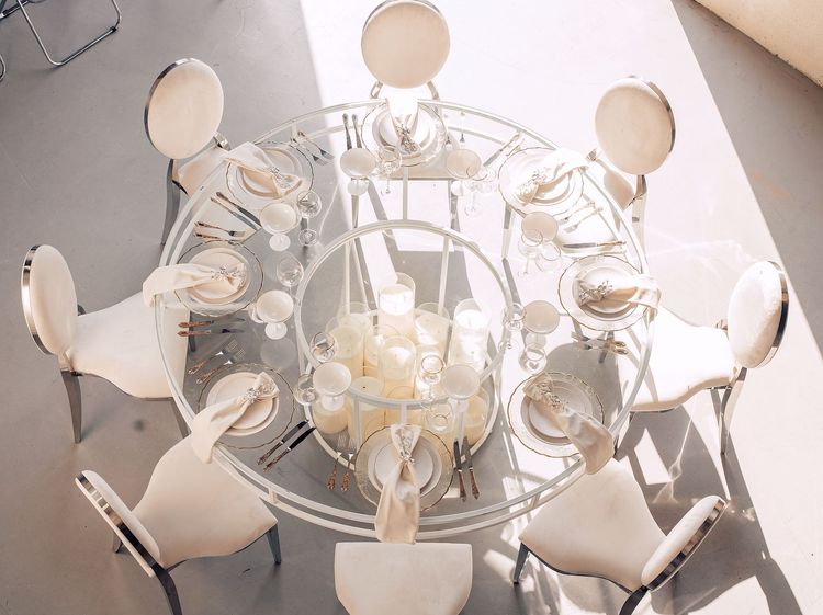 White glass round table modern setup
