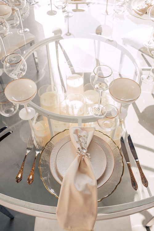 White glass round table modern setup