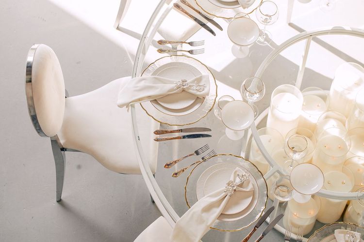 White glass round table modern setup