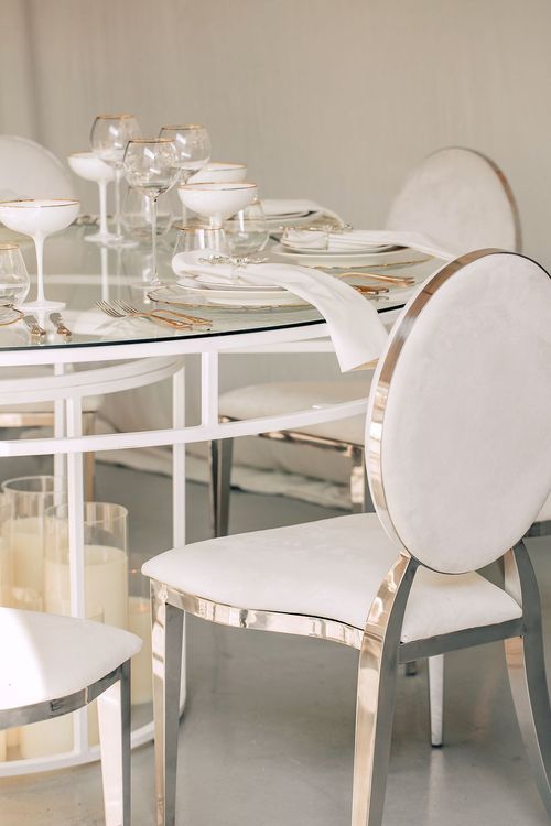 White glass round table modern setup