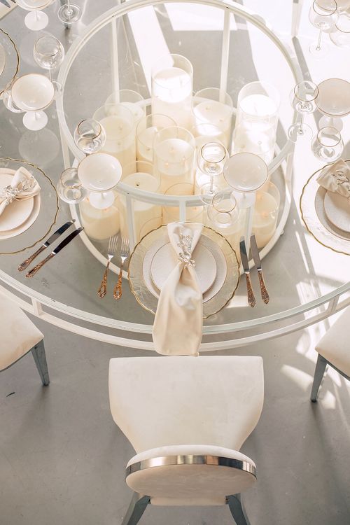 White glass round table modern setup