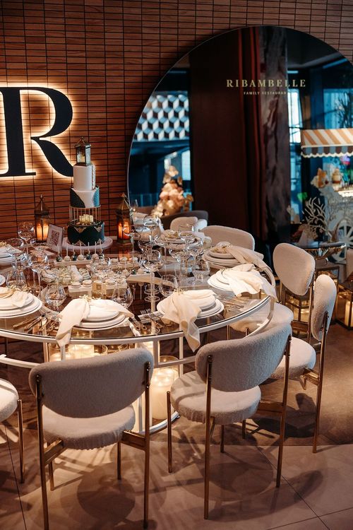 White glass table cozy chairs