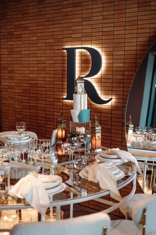 White glass table cozy chairs