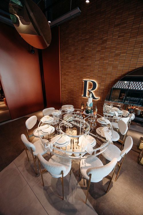 White glass table cozy chairs