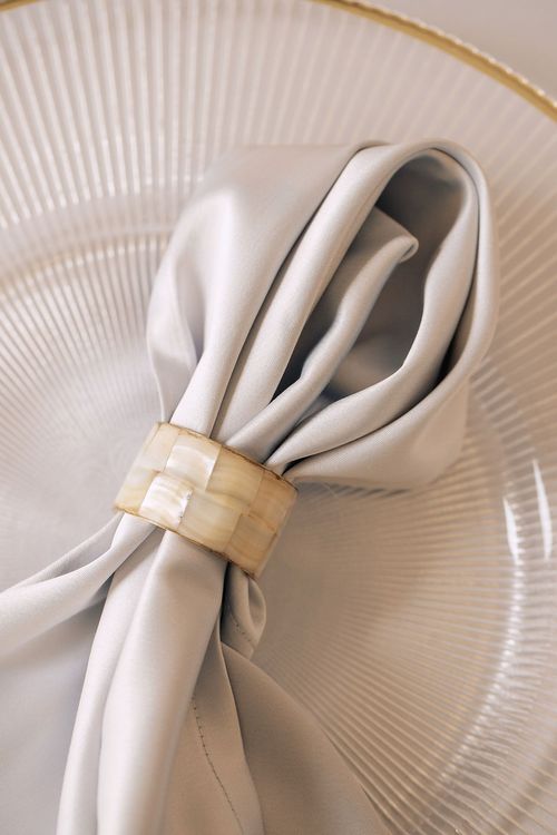 White-gold table setting with lanterns