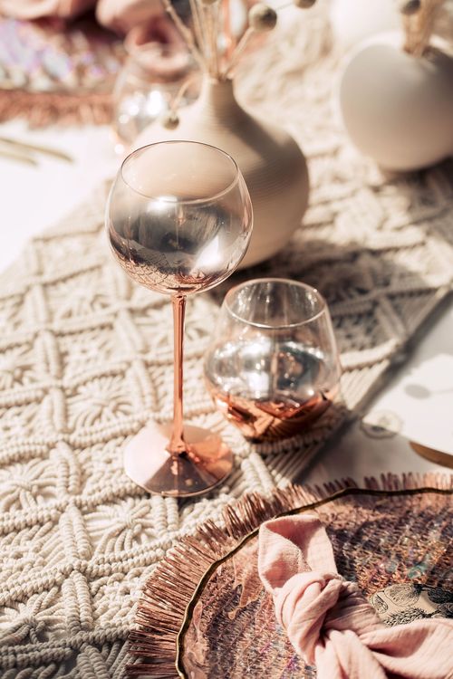 White-pink boho table setting with pearl accents