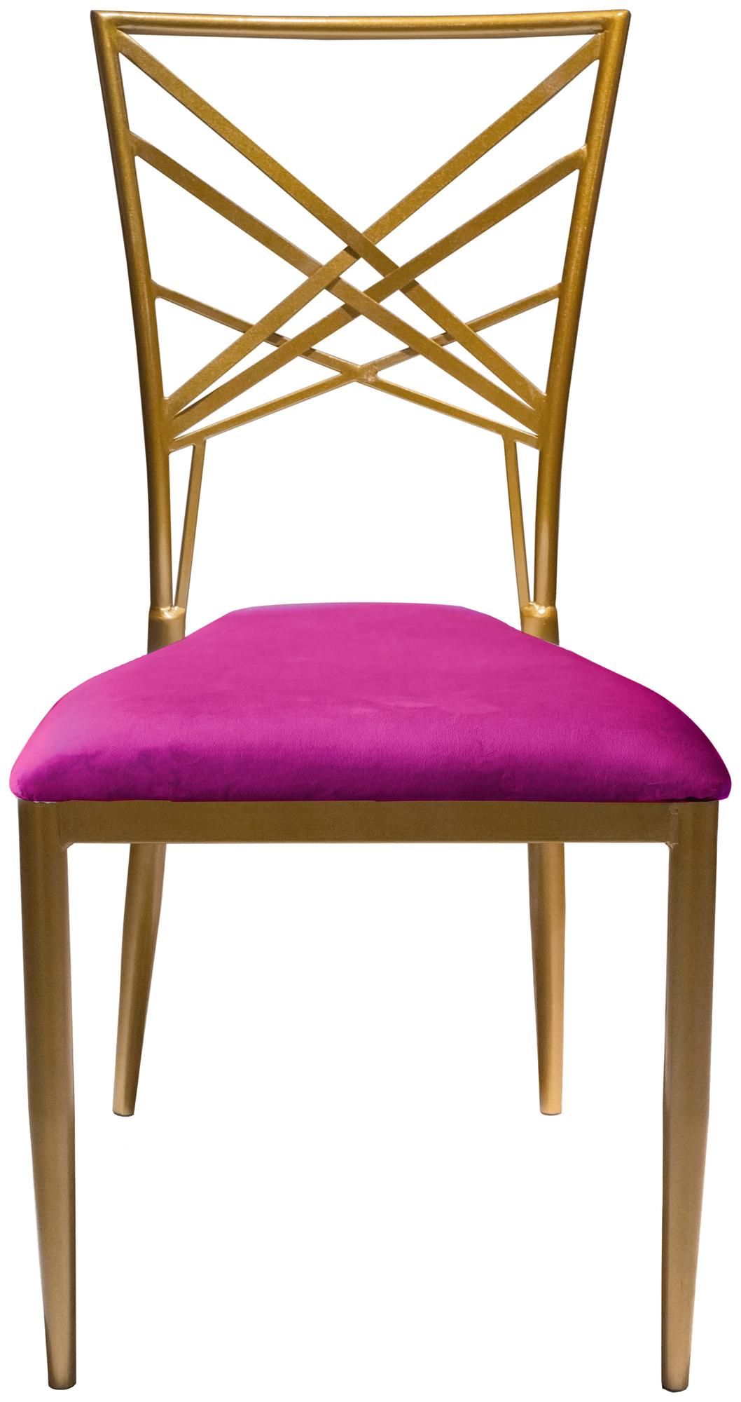 Gold lattice-back chair with a vibrant Barbie pink velvet seat styled with matching accents and glossy tableware in a playful, luxurious setup.