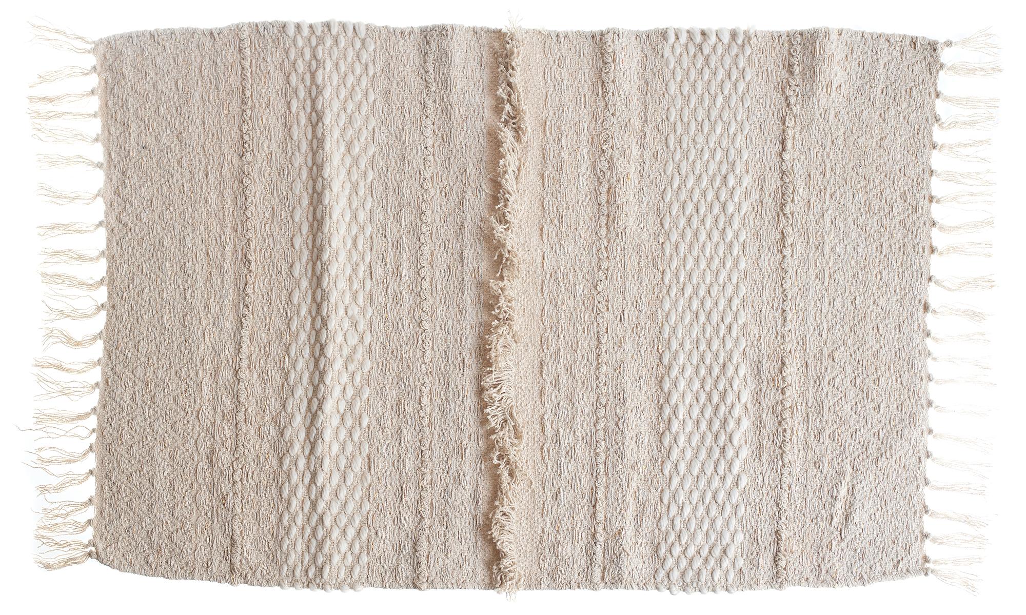 KRAUSS handwoven rug — natural beige tone, handmade texture, perfect for cozy boho lounges and event spaces.